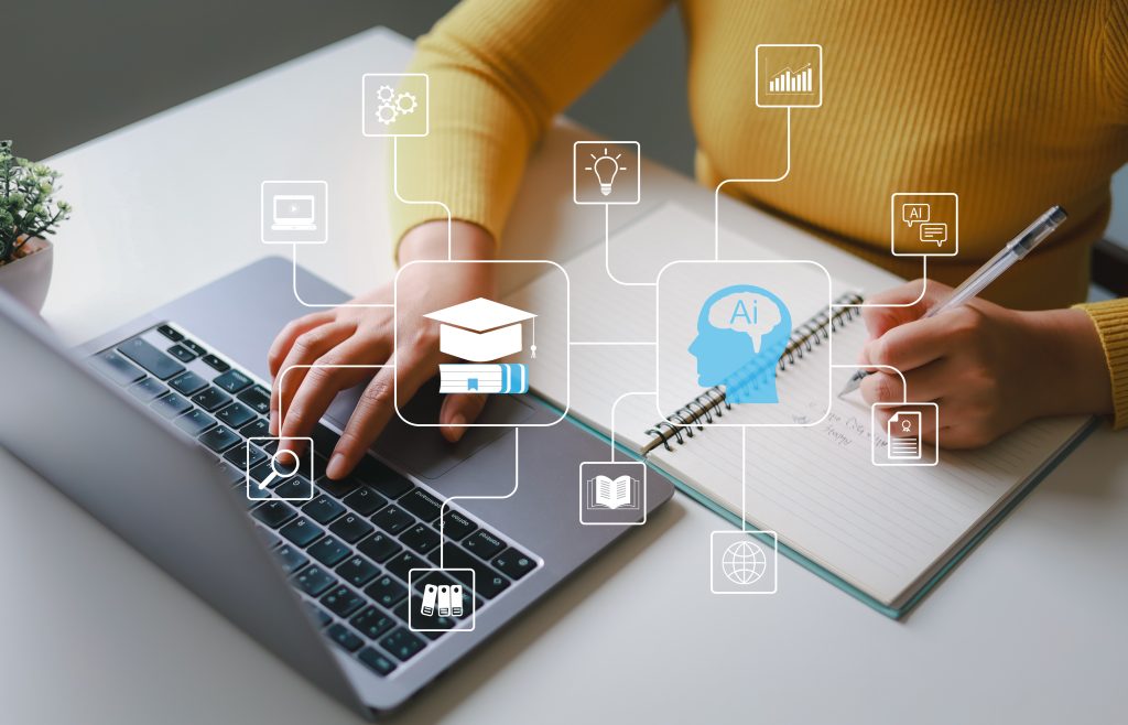 Woman using laptop with AI icon